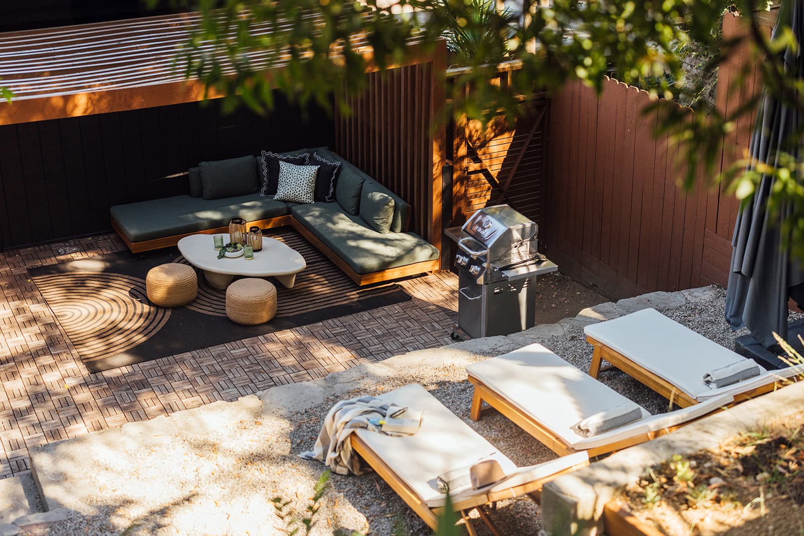 The garden and terrace in afternoon light, arranged for time outdoors